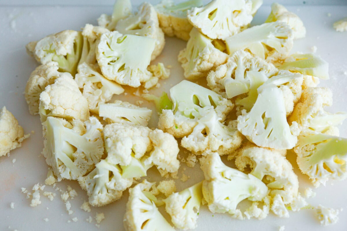 Fried cauliflower is my go-to crispy, low-carb snack that sneaks in some extra veggies and fiber. I make them for my kids all the time. They think they’re just getting a treat, but I know better! Cauliflower cut into bite sized florets.